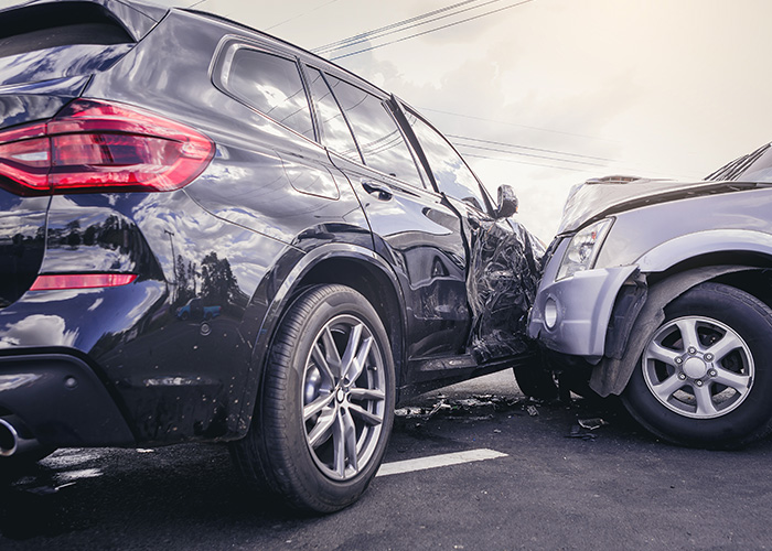 two cars colliding in an accident